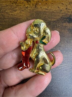 Gold Dog Holiday Brooch with Red Stocking